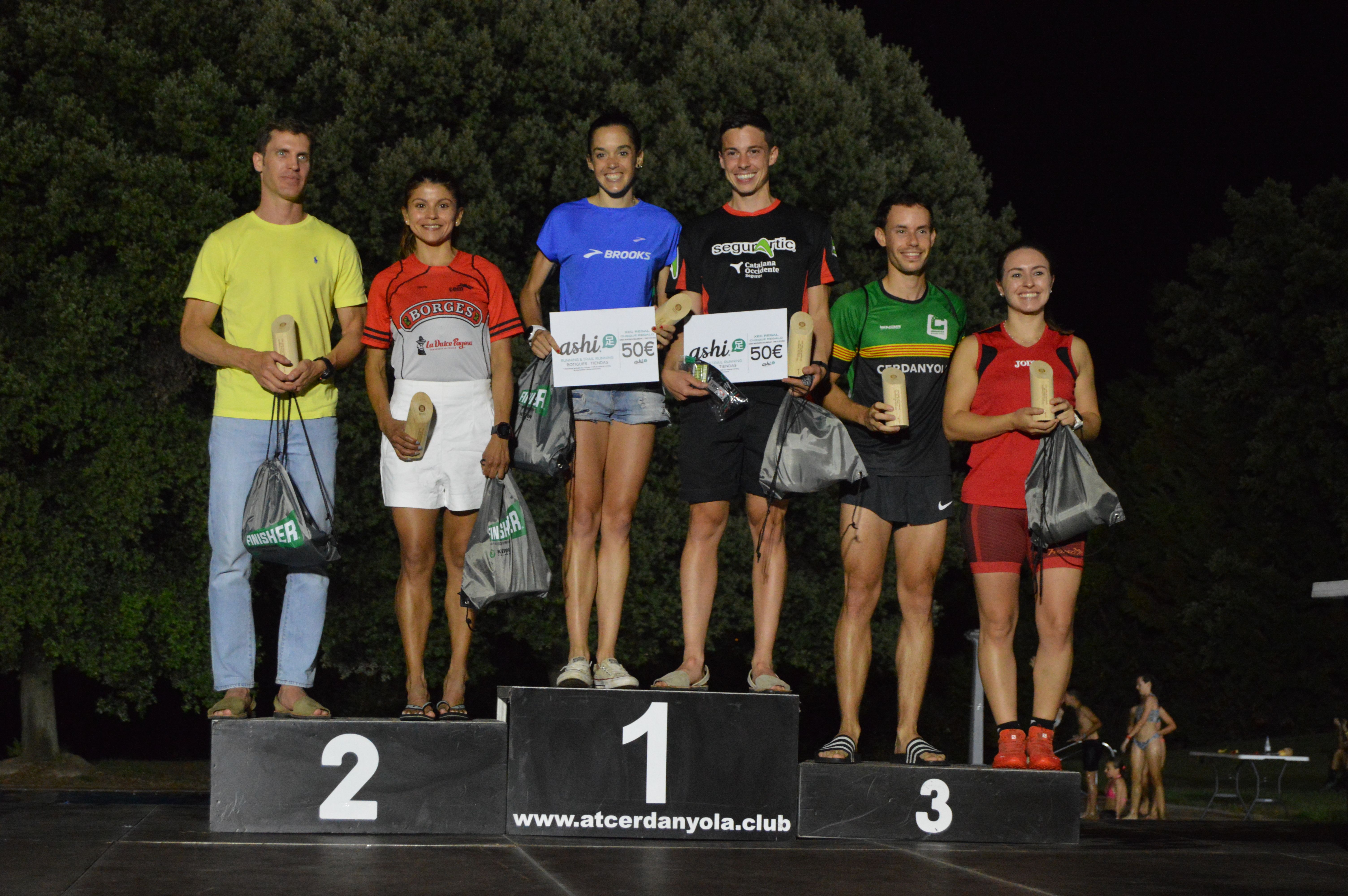 Pòdium masculí i femení de 14 km de la 30a Cura per Collserola. FOTO: Nora Muñoz Otero