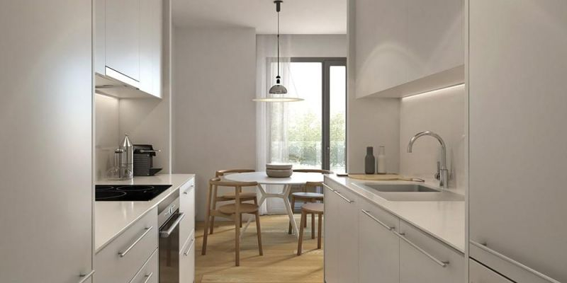  La eficient distribució de la cuina afavoreix la màxima comoditat de treball amb zones de treball perfectament delimitades. Promoció d’Uniq Residential a la plaça San Juan de la Cruz, 4, de Madrid. FOTO: Cedida