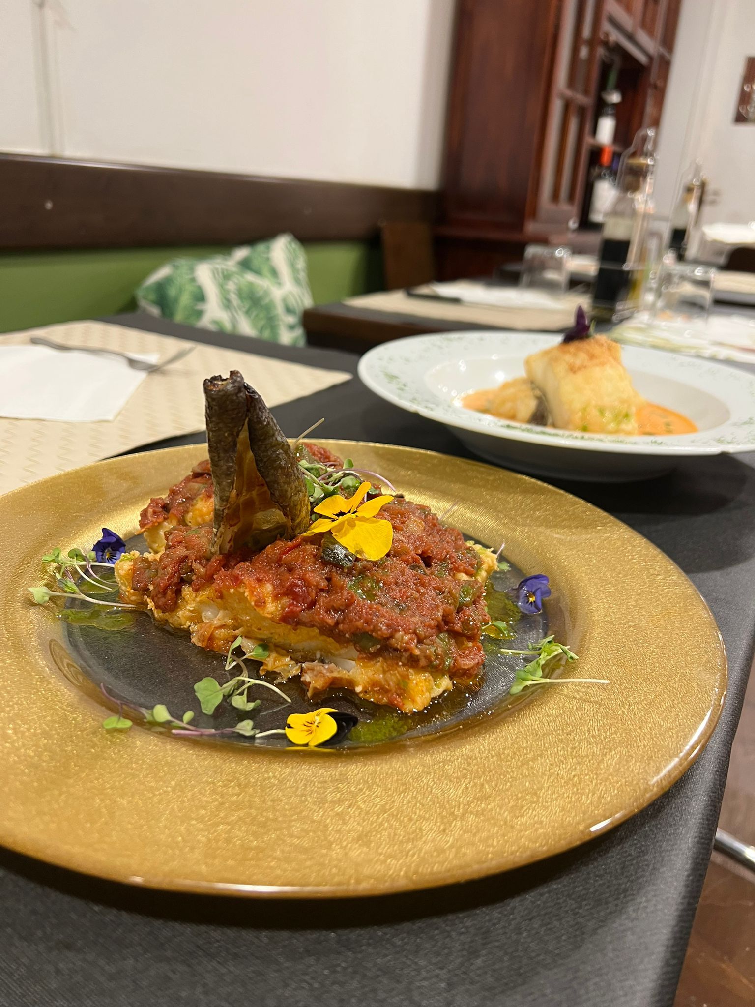 Plats de bacallà al restaurant El Racó de la Plaça. Foto: Laia Jubany