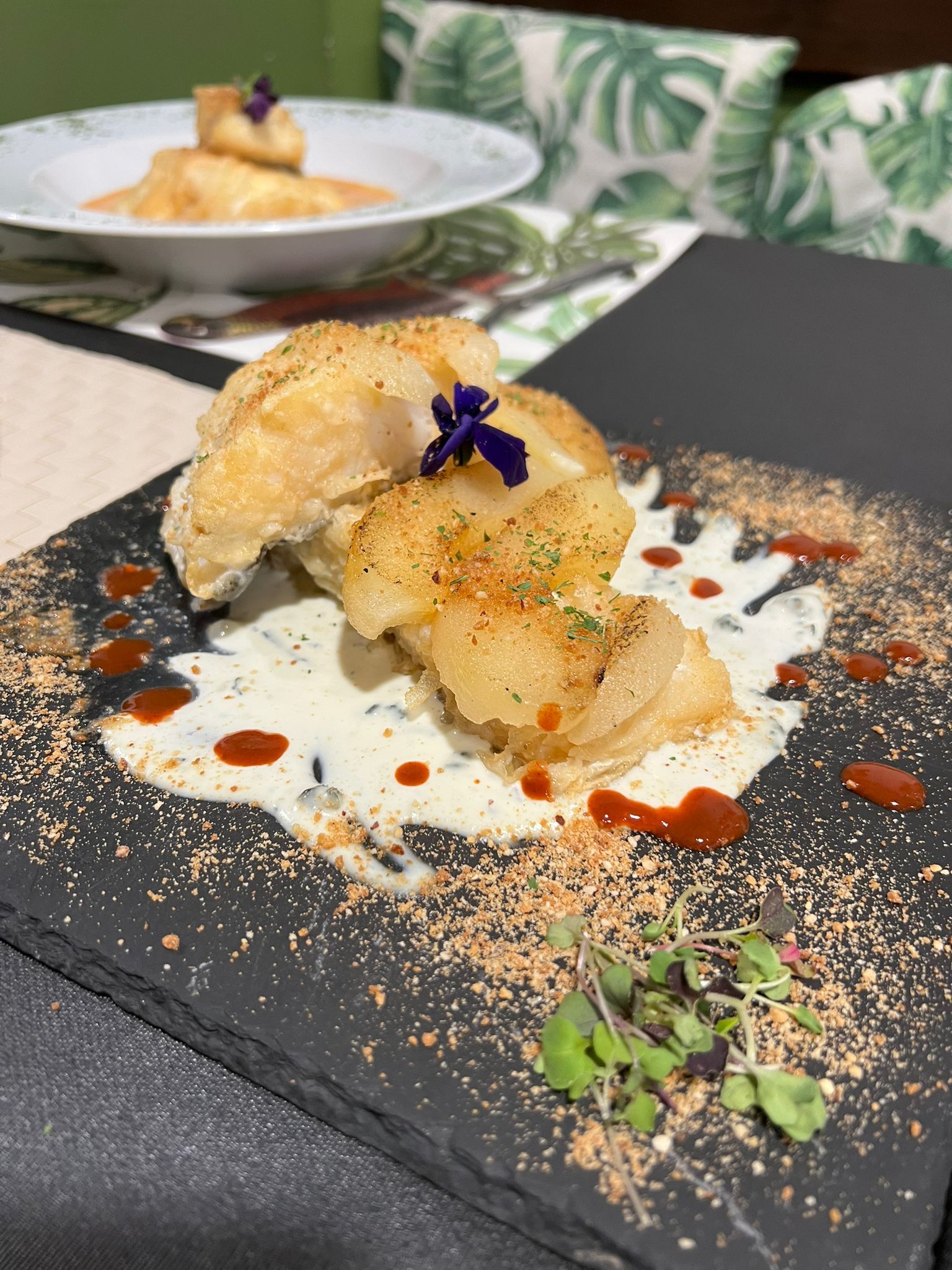 Plats de bacallà al restaurant El Racó de la Plaça. Foto: Laia Jubany