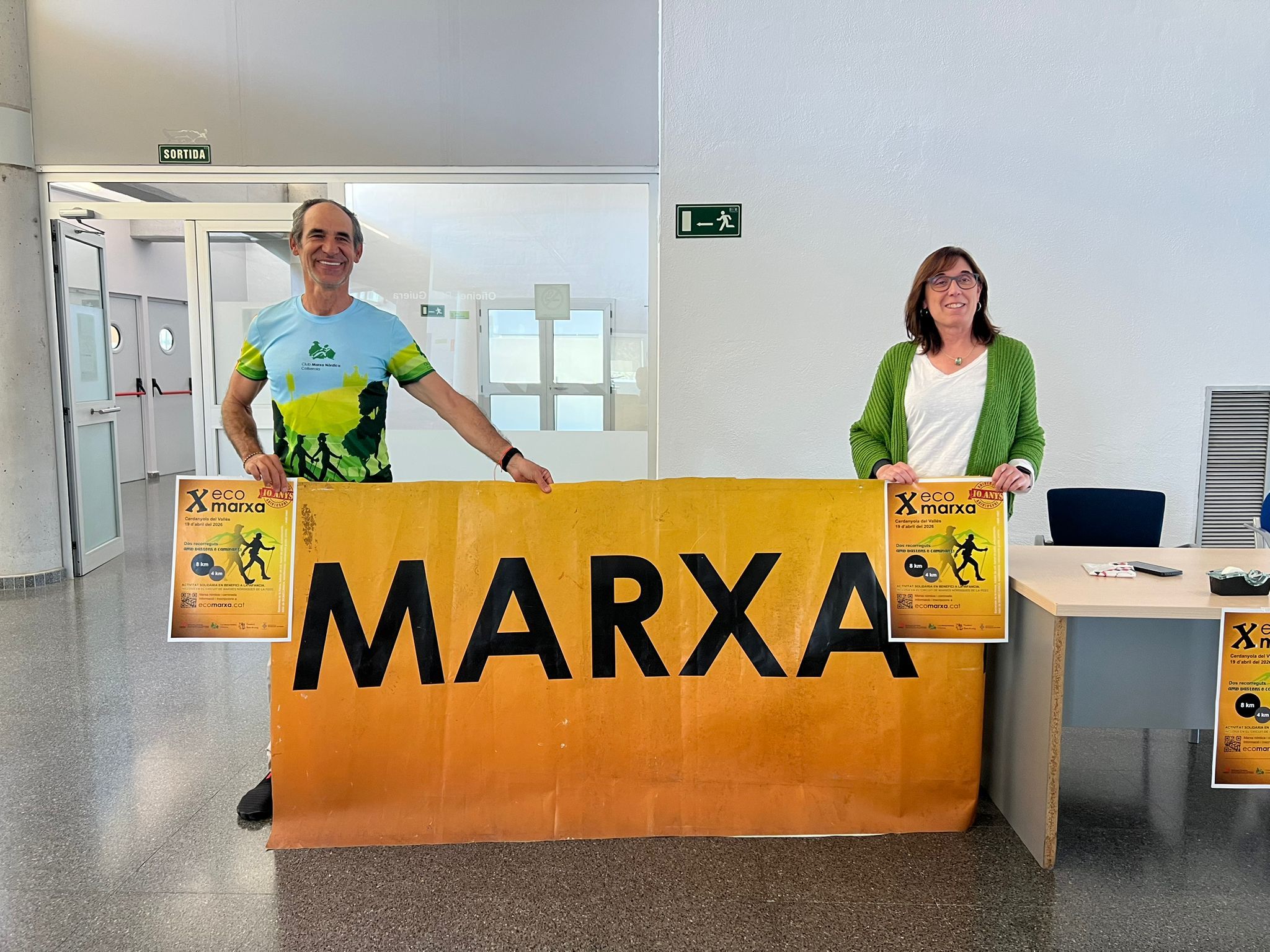 A l'esquerra Xavier Ortega, a la dreta Eva Ozcoz, durant la presentació de la 10a ECOMARXA al Guiera. Foto: Laia Jubany